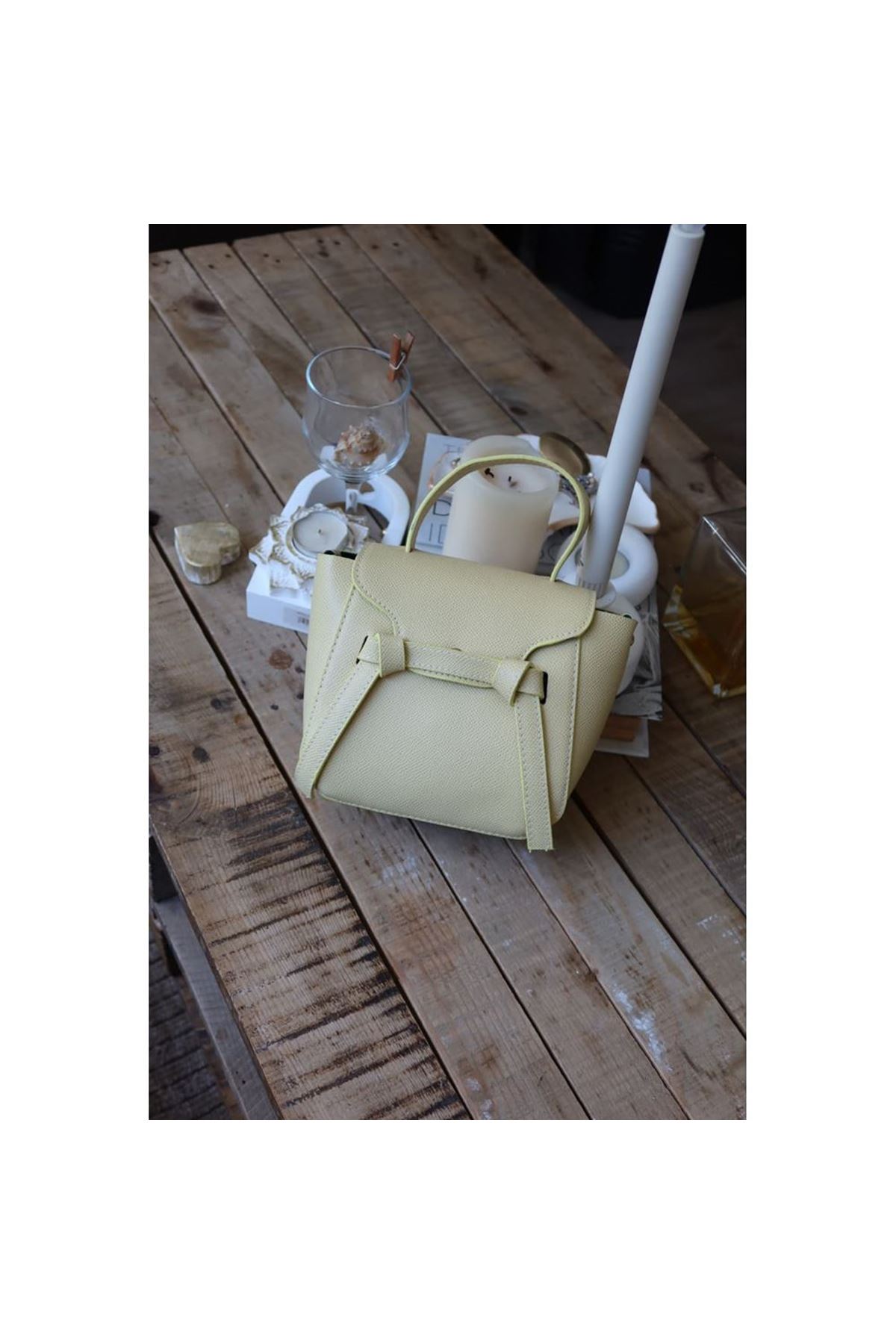 butter yellow şerit detaylı tutma saplı el omuz çantası